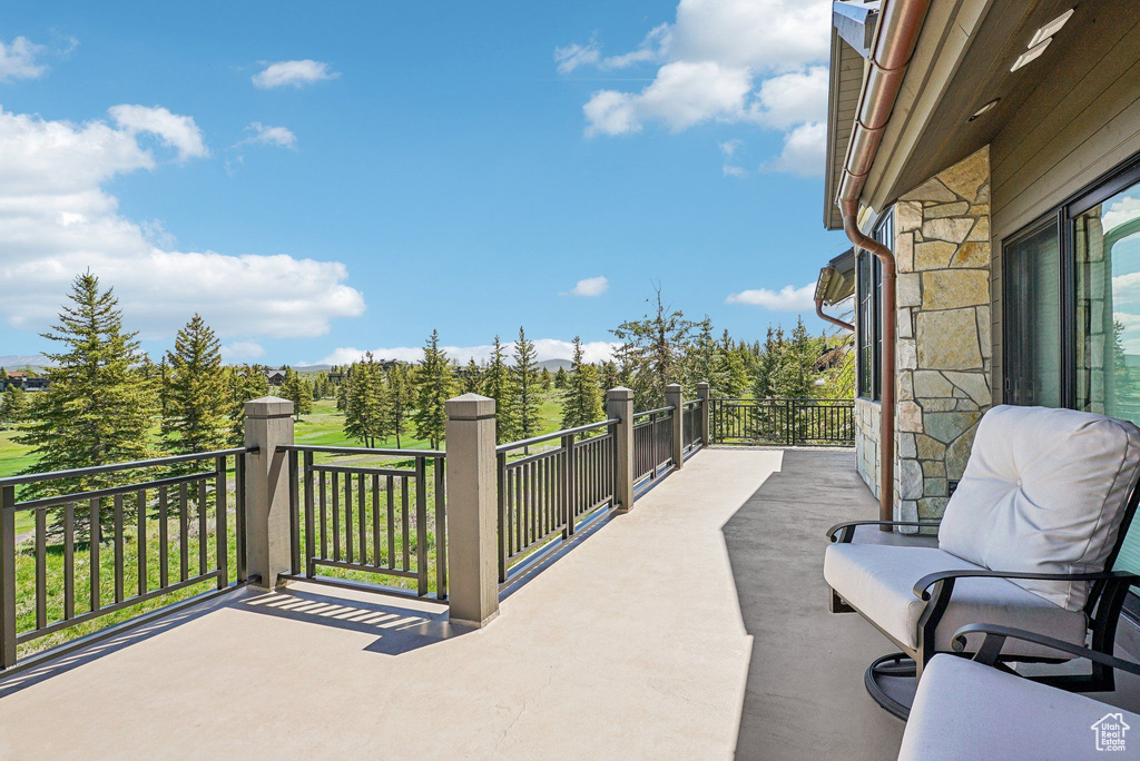 View of patio / terrace featuring a balcony