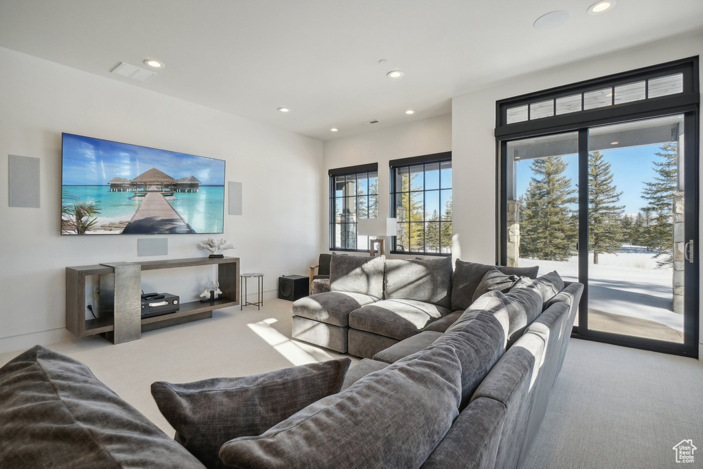 Living area featuring carpet flooring and recessed lighting