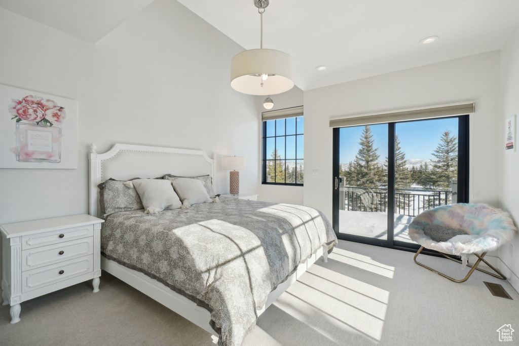 Carpeted bedroom featuring access to outside and recessed lighting