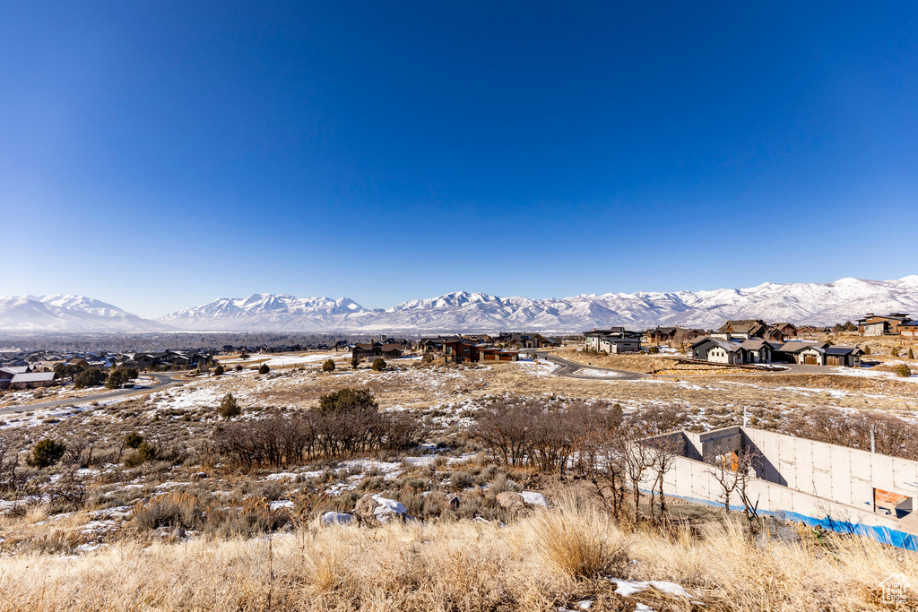 View of mountain backdrop with nearby suburban area