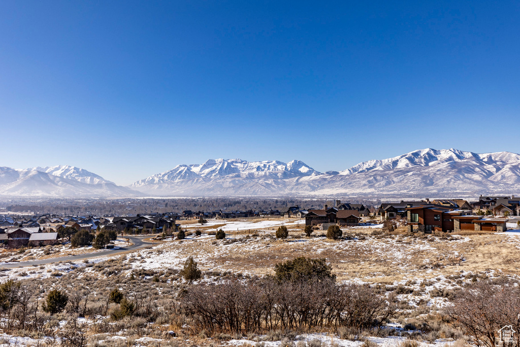 View of mountain backdrop with nearby suburban area