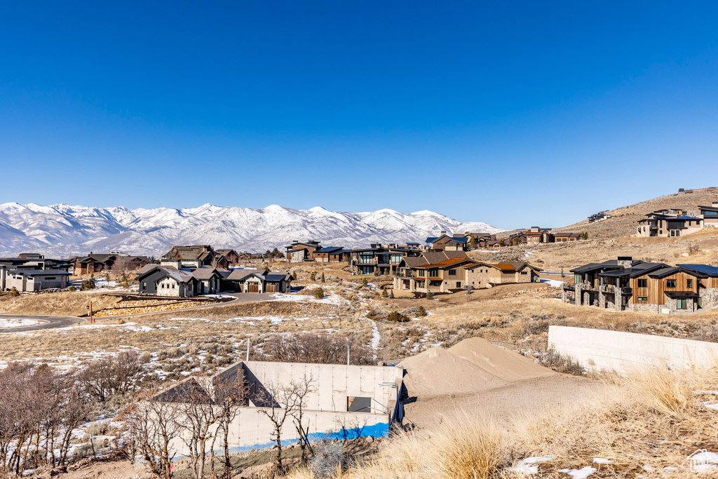 View of mountain backdrop with nearby suburban area