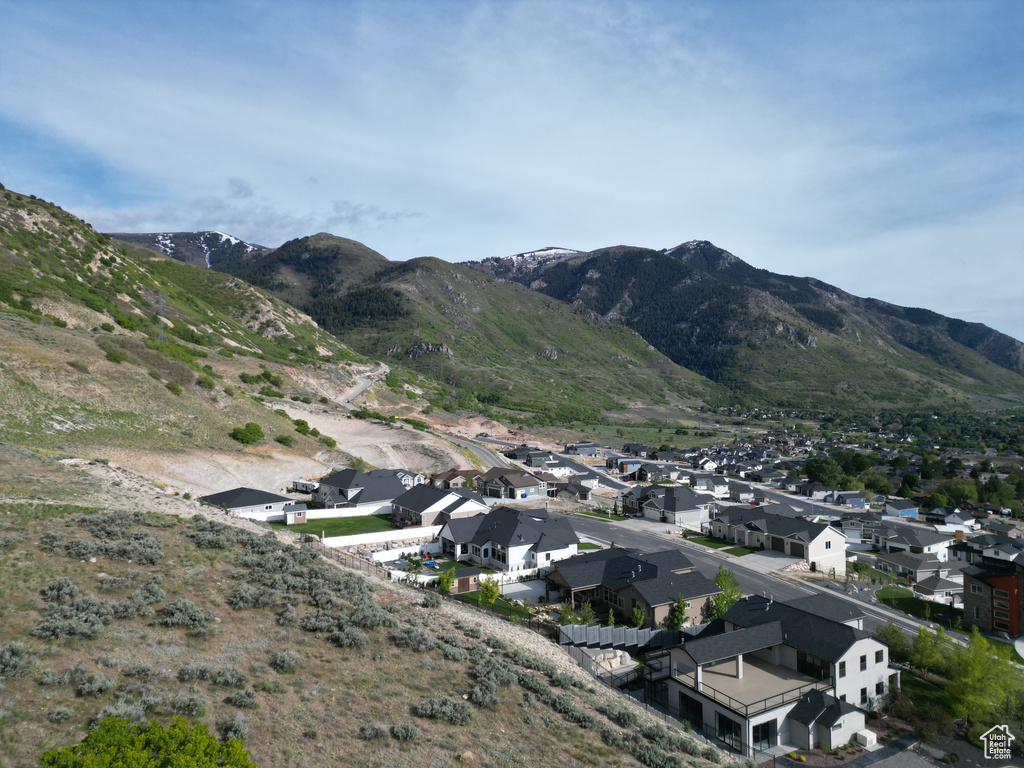 Property view of mountains featuring a residential view