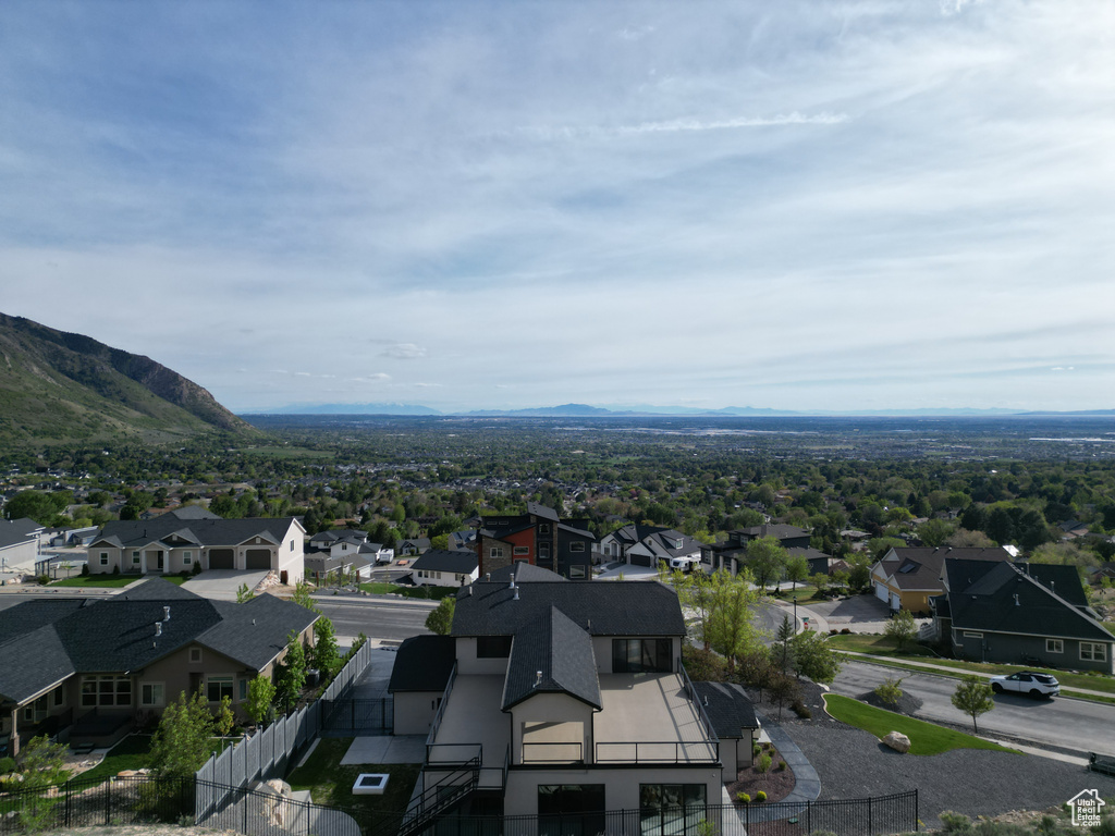 Drone / aerial view with a mountain view and a residential view