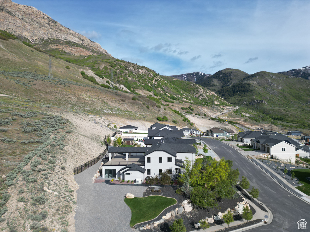 Property view of mountains featuring a residential view