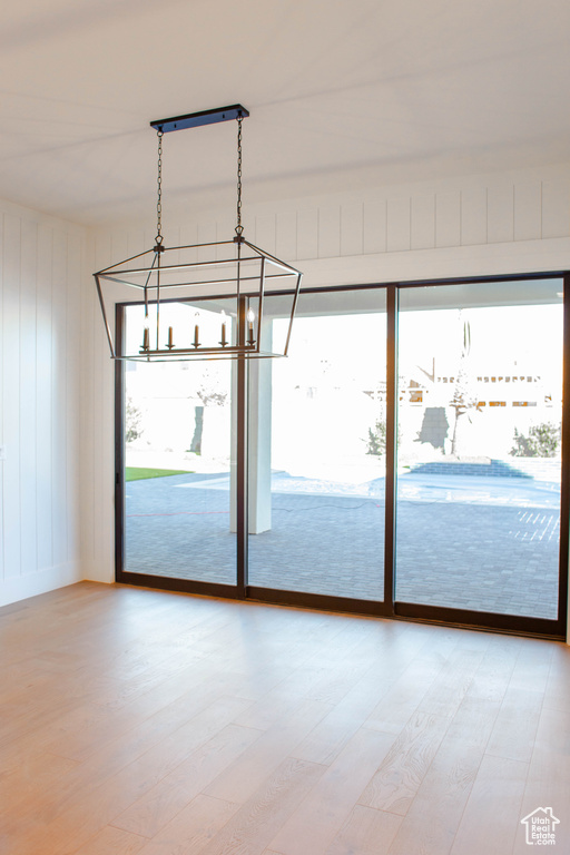 Interior space featuring hardwood / wood-style flooring and a healthy amount of sunlight