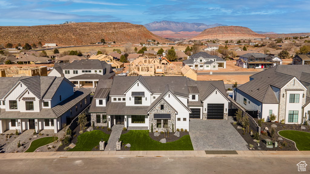 Birds eye view of property featuring a mountain view