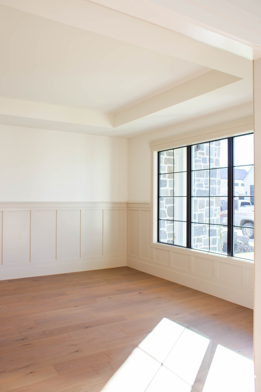 Unfurnished room with light wood-type flooring