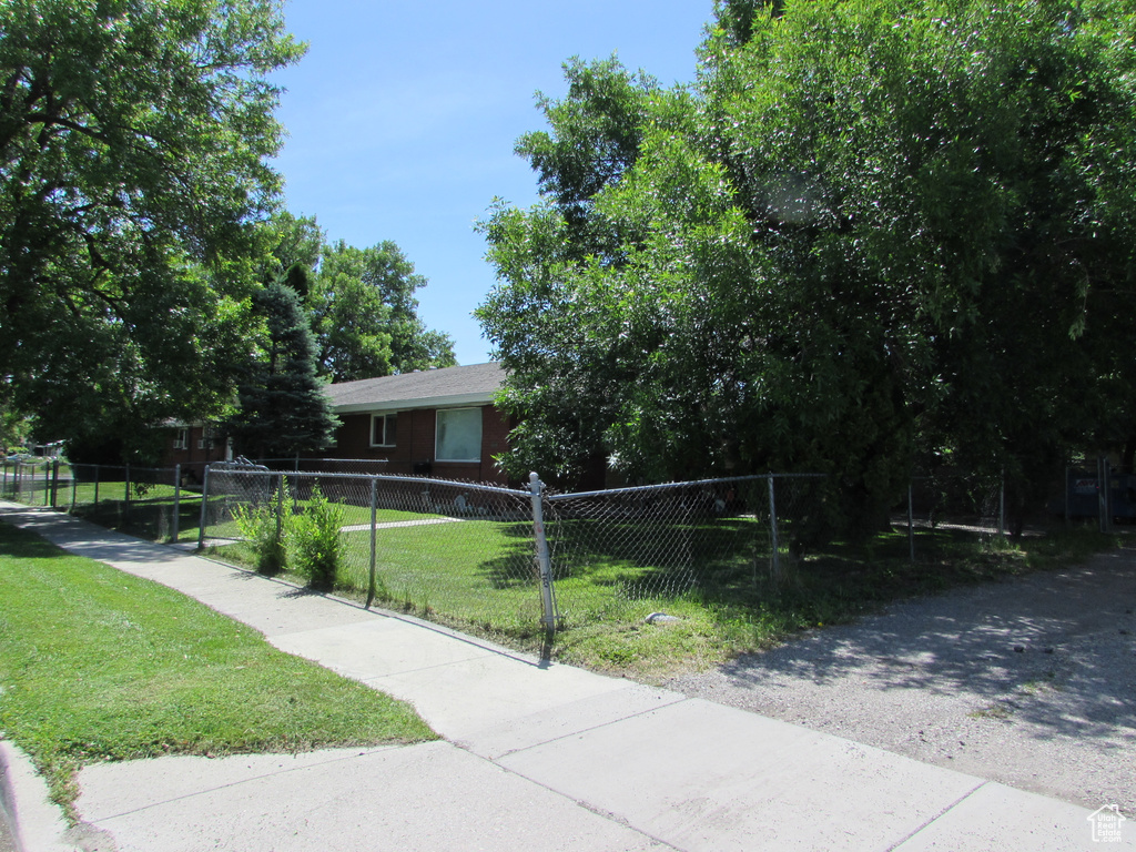 View of front of property with a front yard
