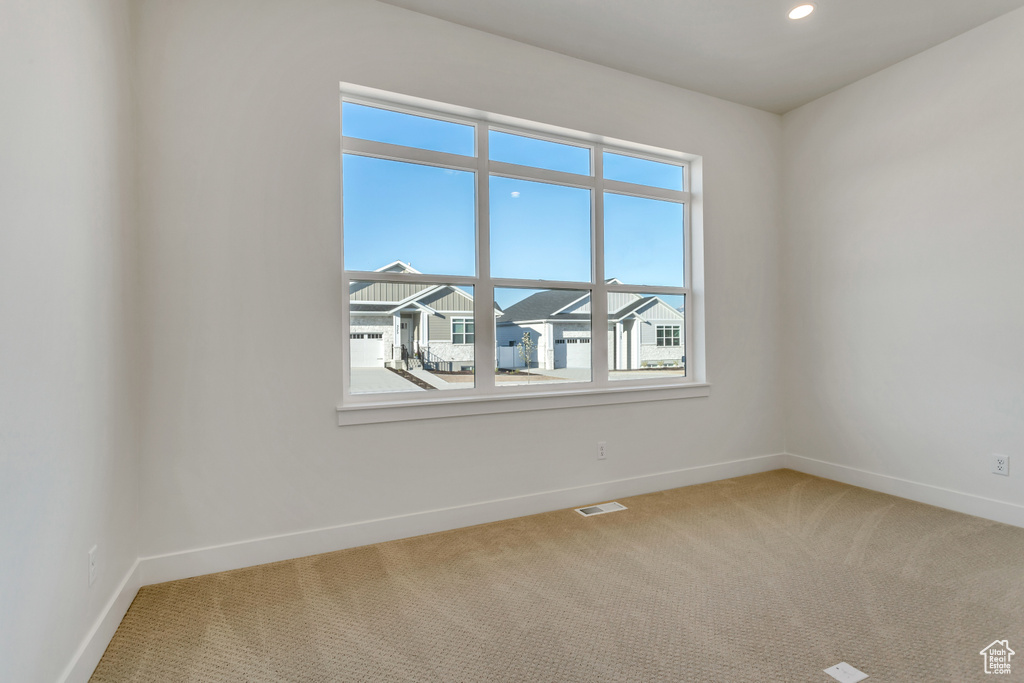 View of carpeted spare room