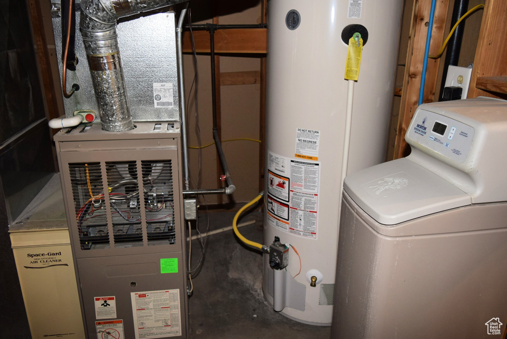 Utility room with heating unit and gas water heater