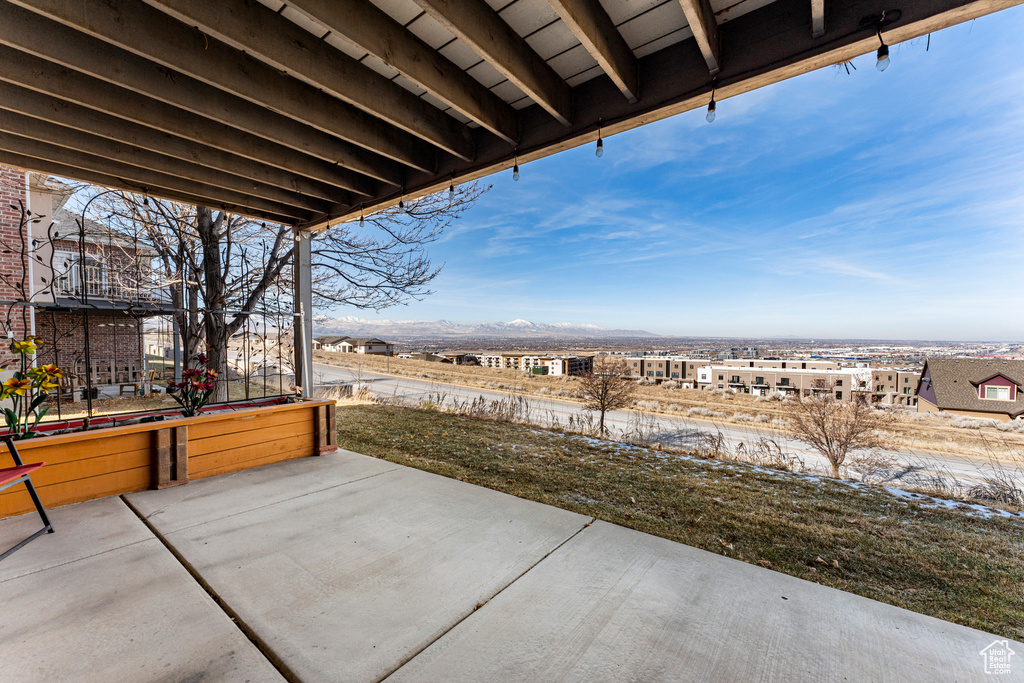 View of patio with a mountain view