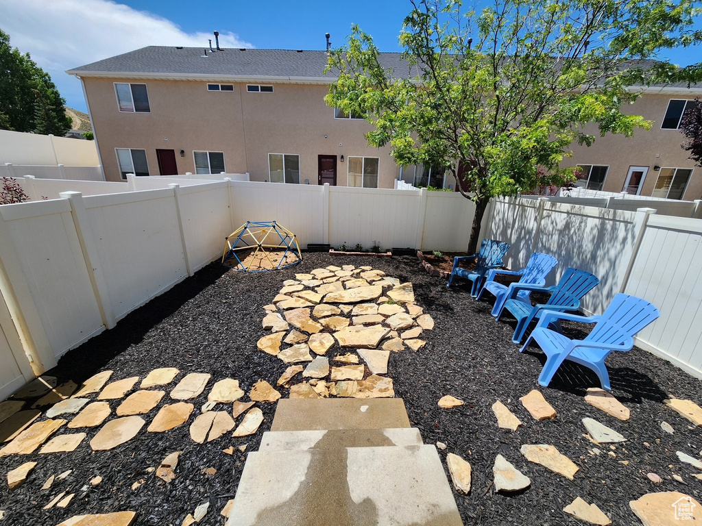 View of fenced backyard