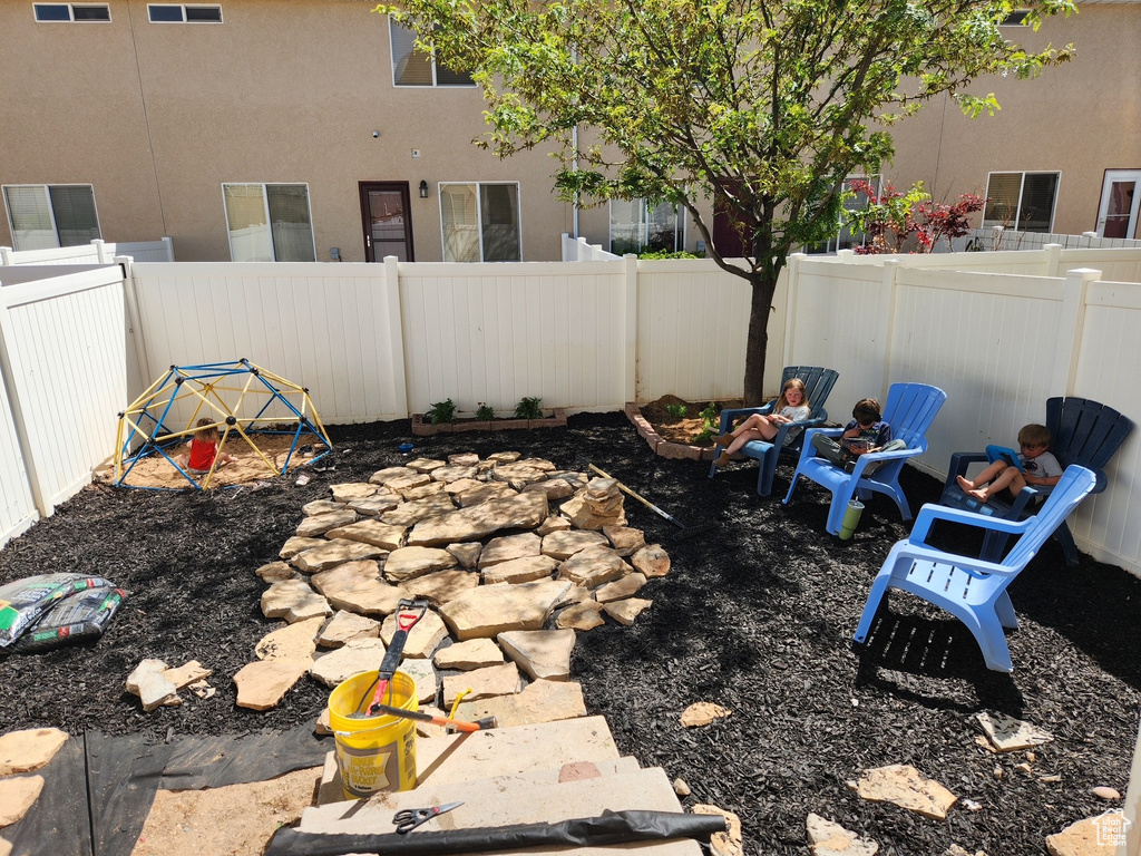 View of fenced backyard