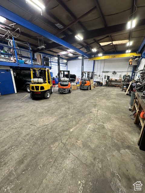 Garage featuring a workshop area