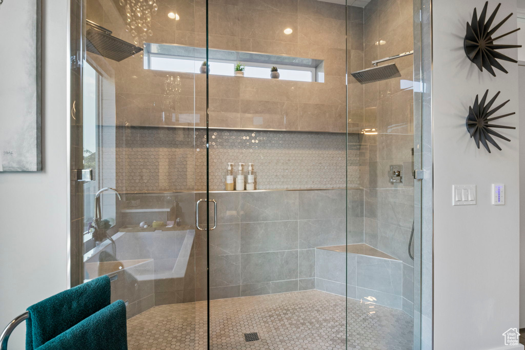 Bathroom with a shower with shower door