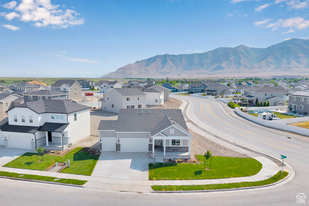 Aerial view of residential area with a mountain backdrop