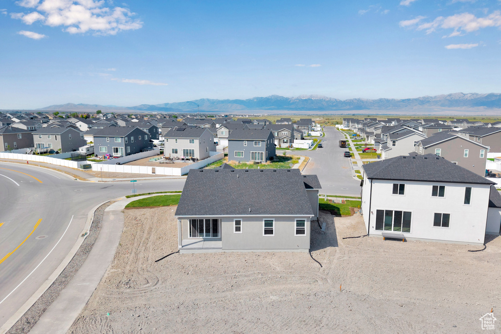 Aerial perspective of suburban area with mountains