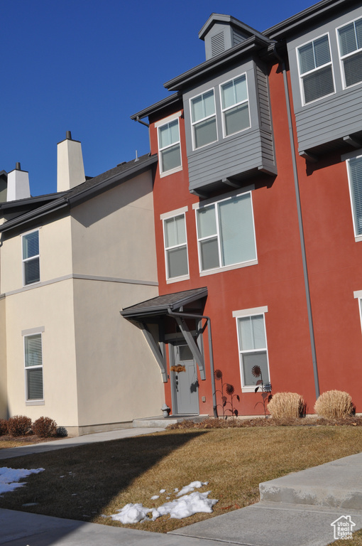 Exterior space with a front yard