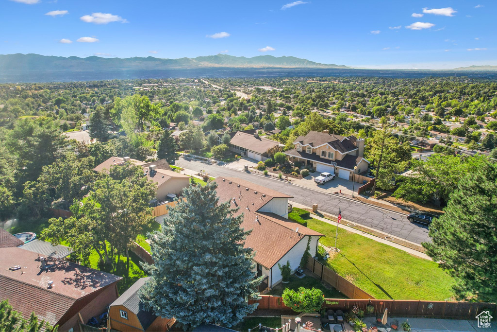 Birds eye view of property featuring a mountain view and a residential view