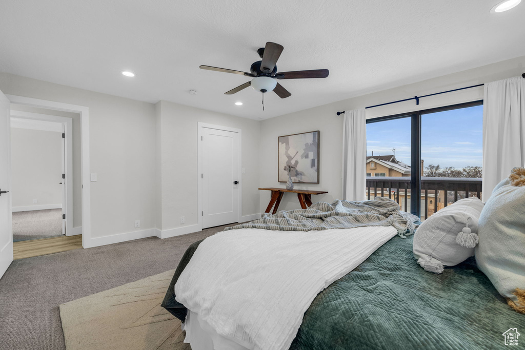 Bedroom with ceiling fan, access to exterior, a closet, and carpet