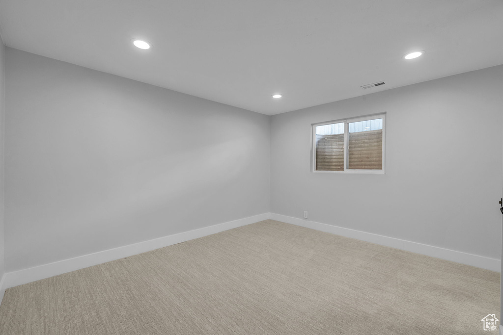 Spare room with light carpet