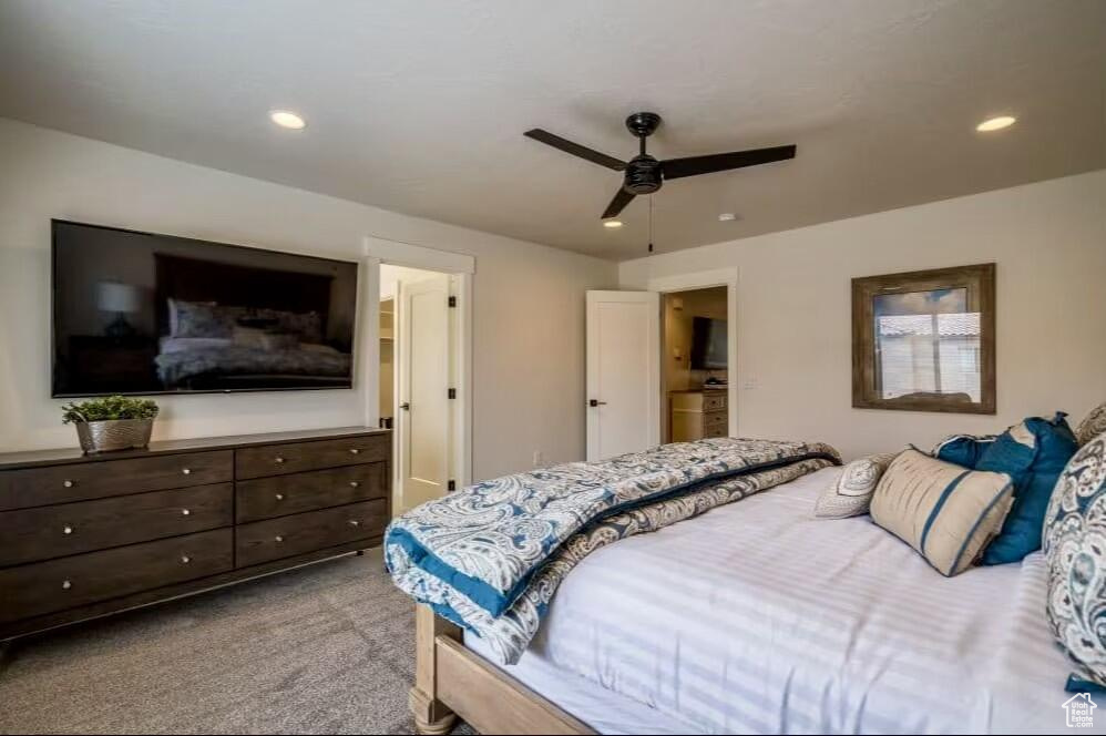 Bedroom with light carpet and ceiling fan