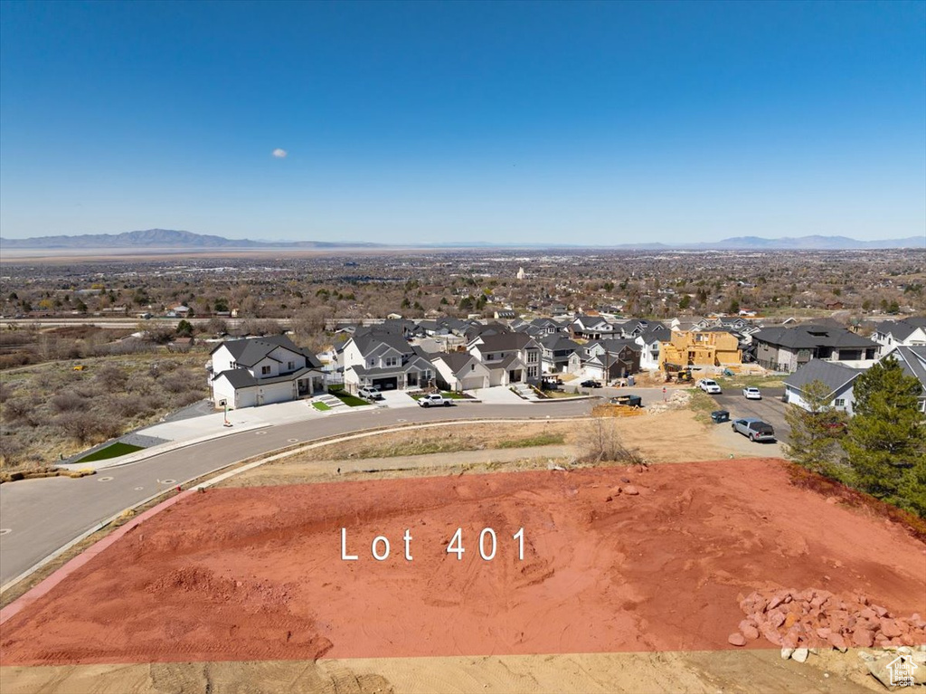 Birds eye view of property featuring a mountain view and a residential view