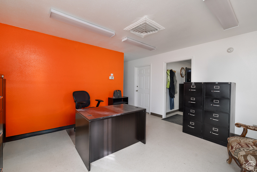 Office space featuring concrete flooring