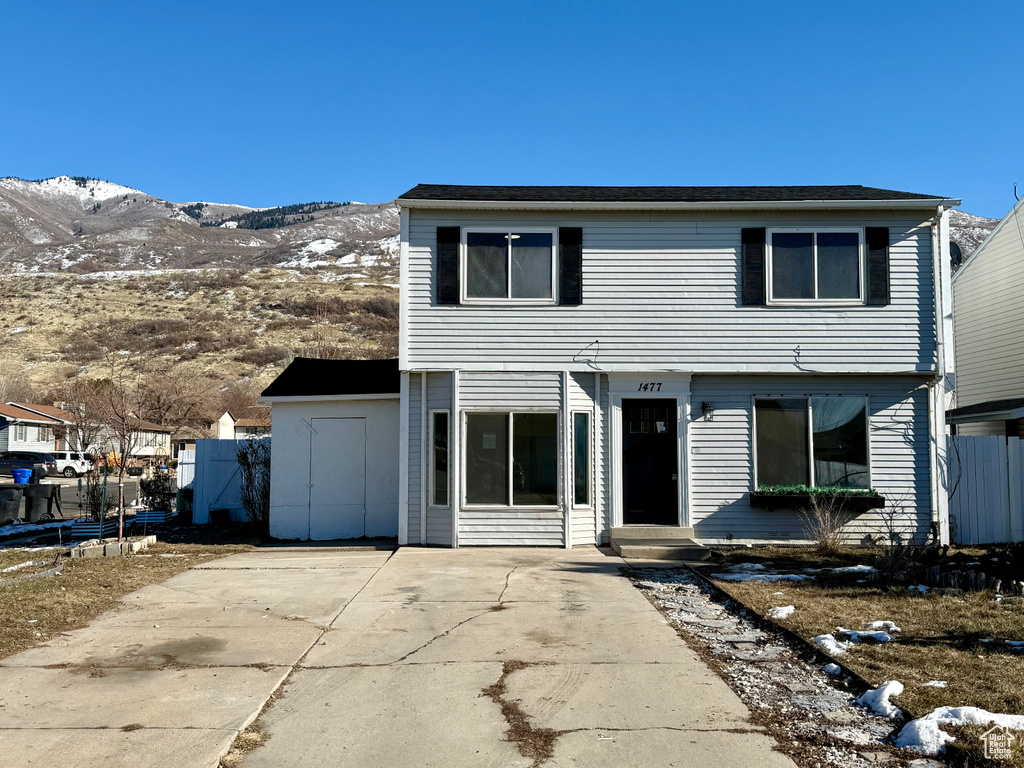 View of front of house featuring a mountain view