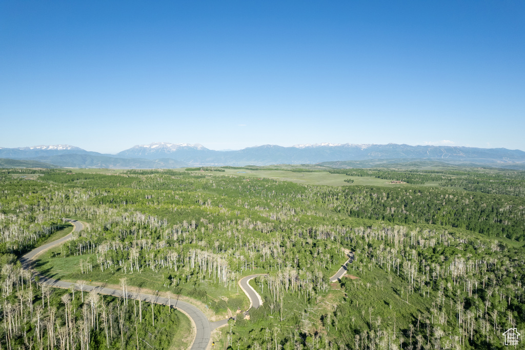 Aerial overview of property\'s location featuring mountains