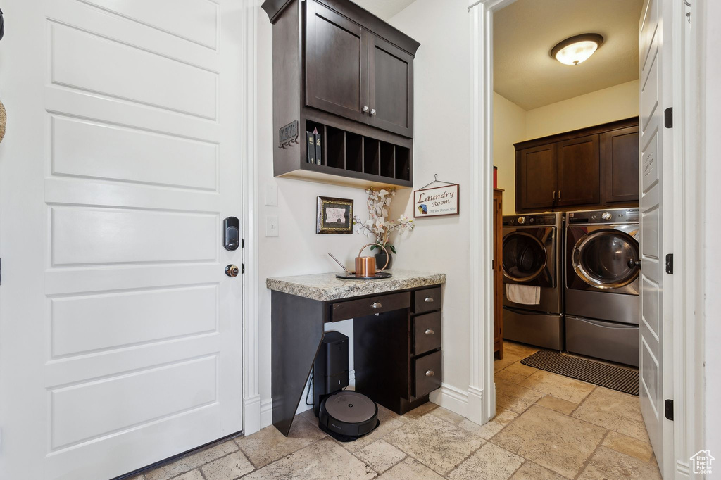 Laundry area with cabinets and washing machine and dryer