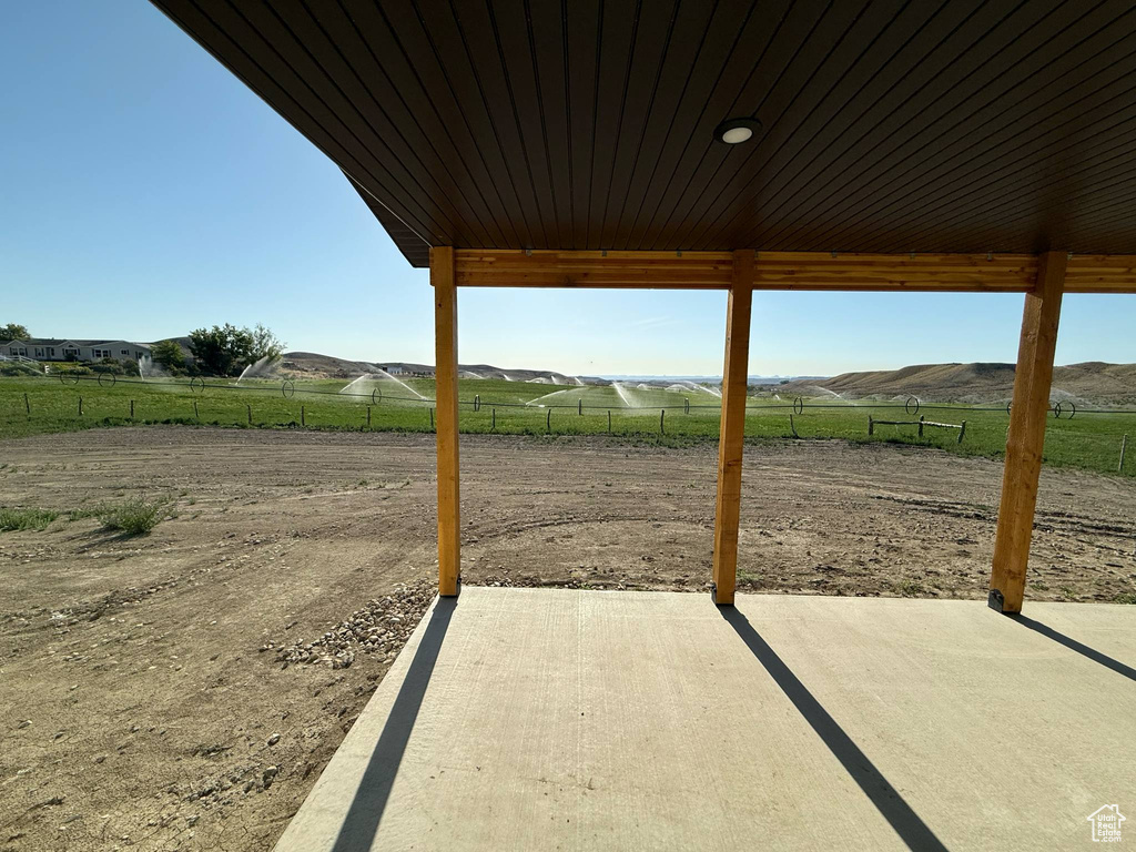 View of patio / terrace featuring a rural view