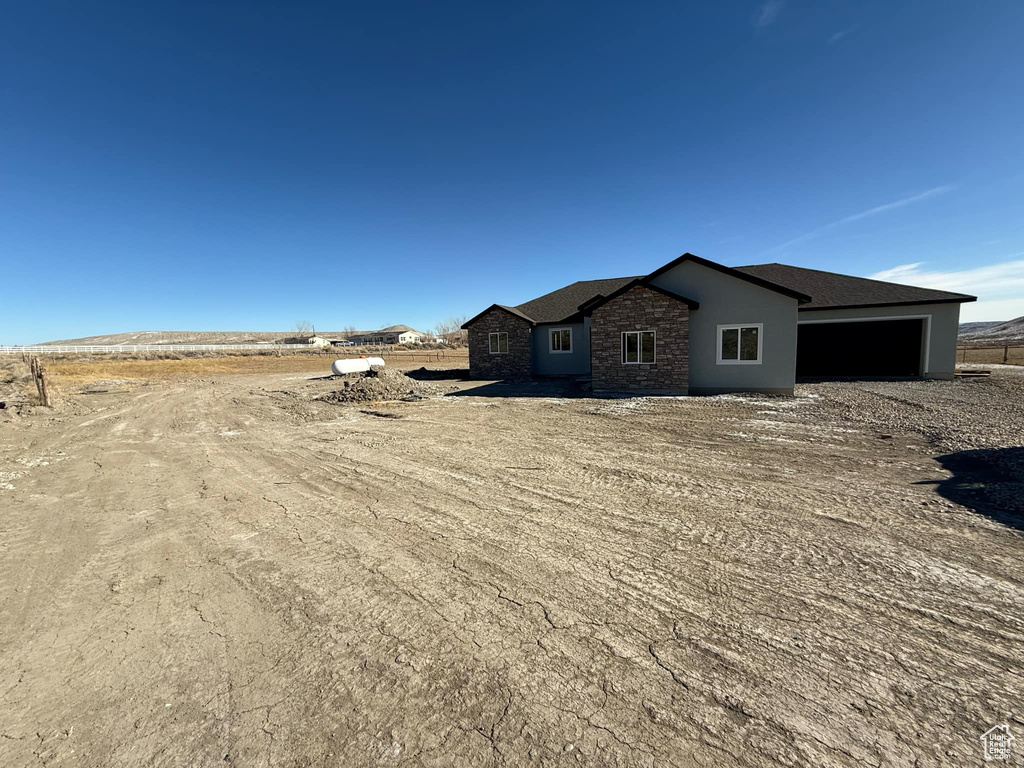 Exterior space with a garage