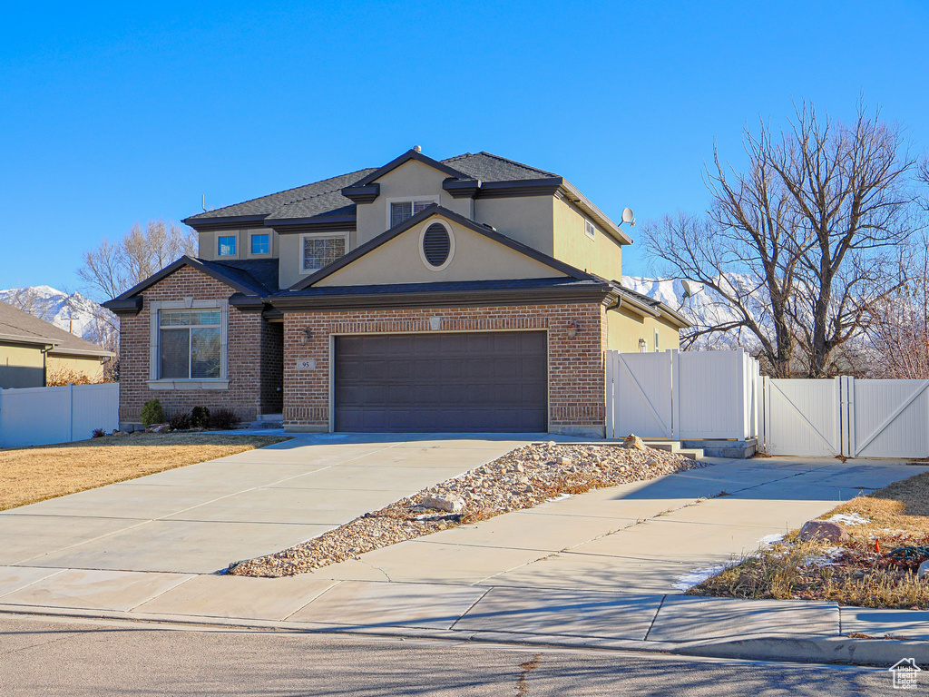 View of property with a mountain view