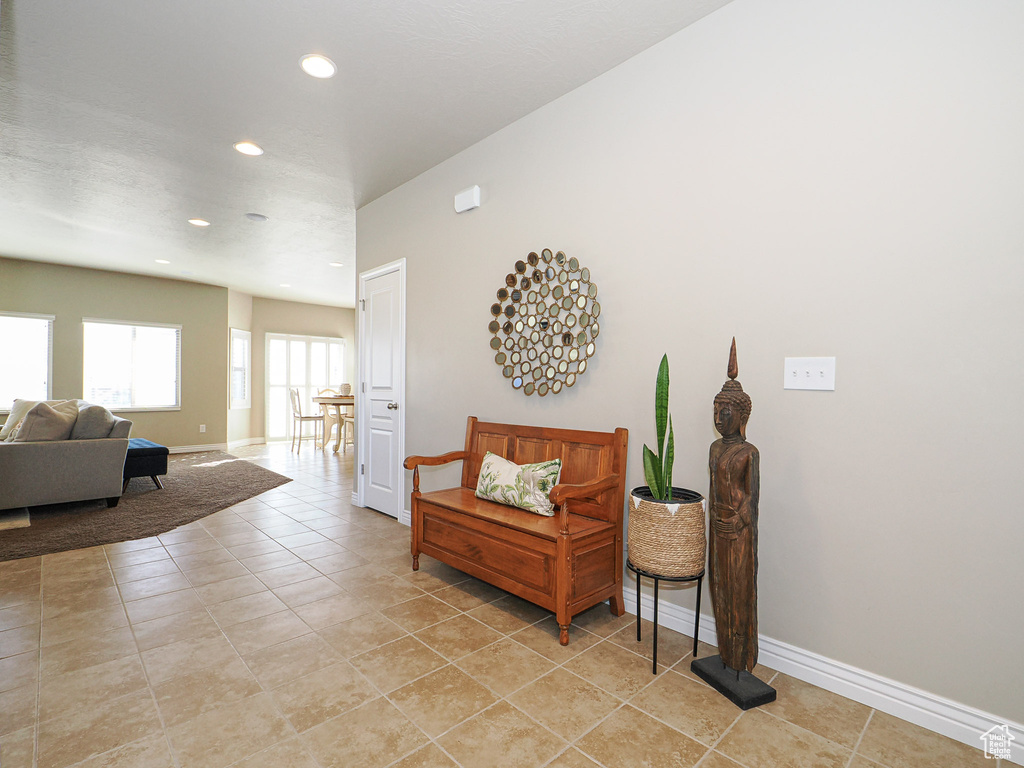 Interior space with light tile patterned floors