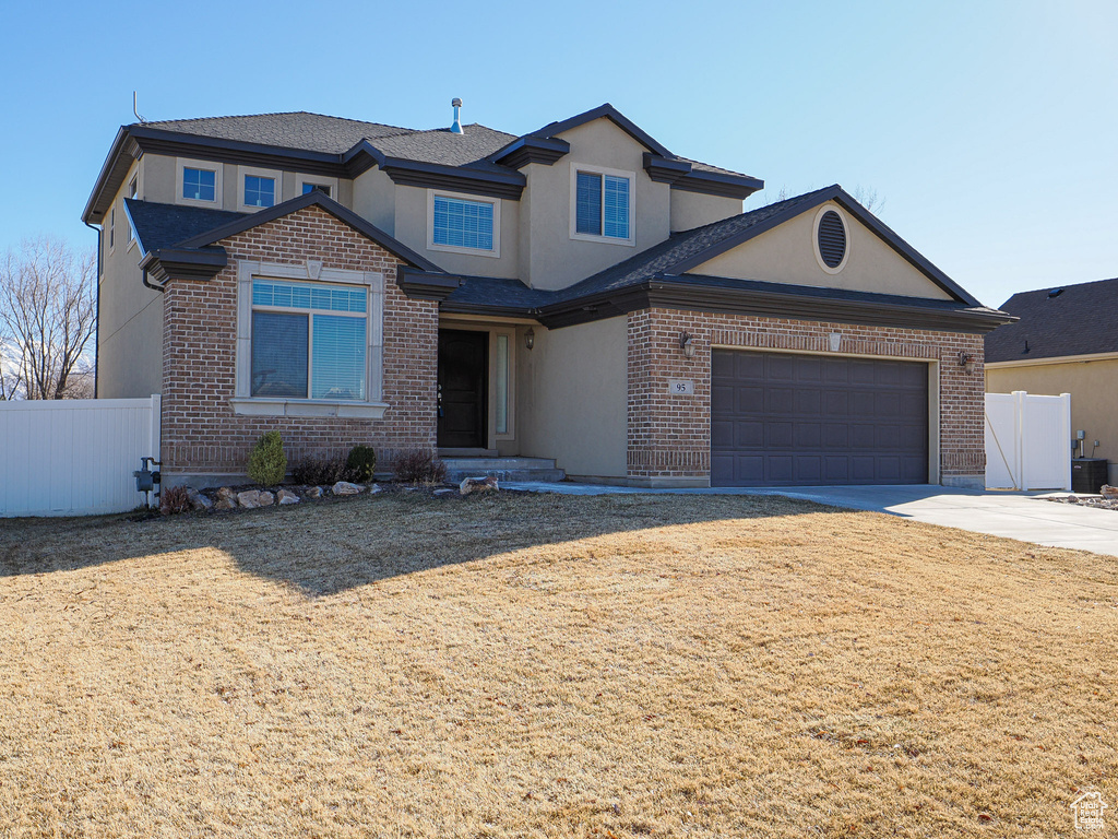 View of front of home with a garage