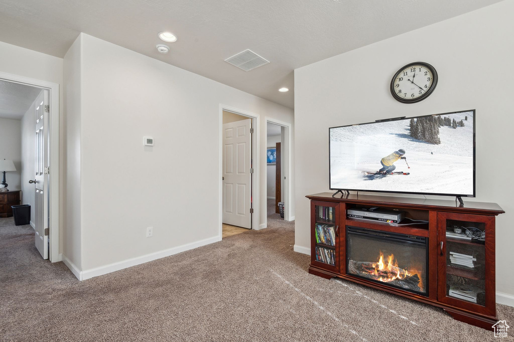 Living room with light carpet