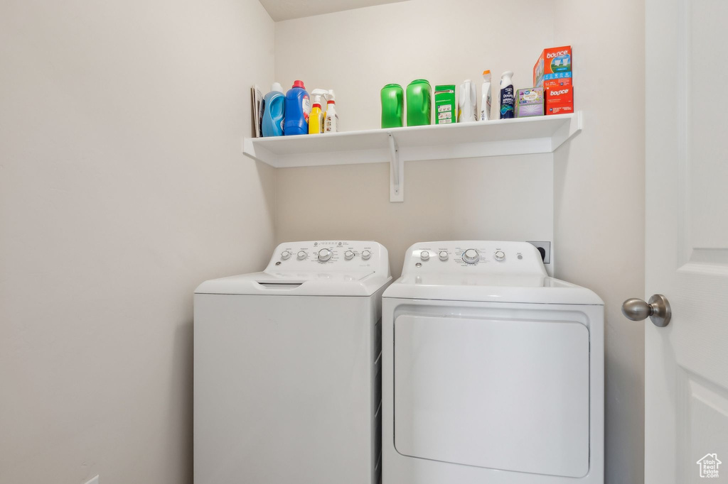 Clothes washing area with washer and dryer