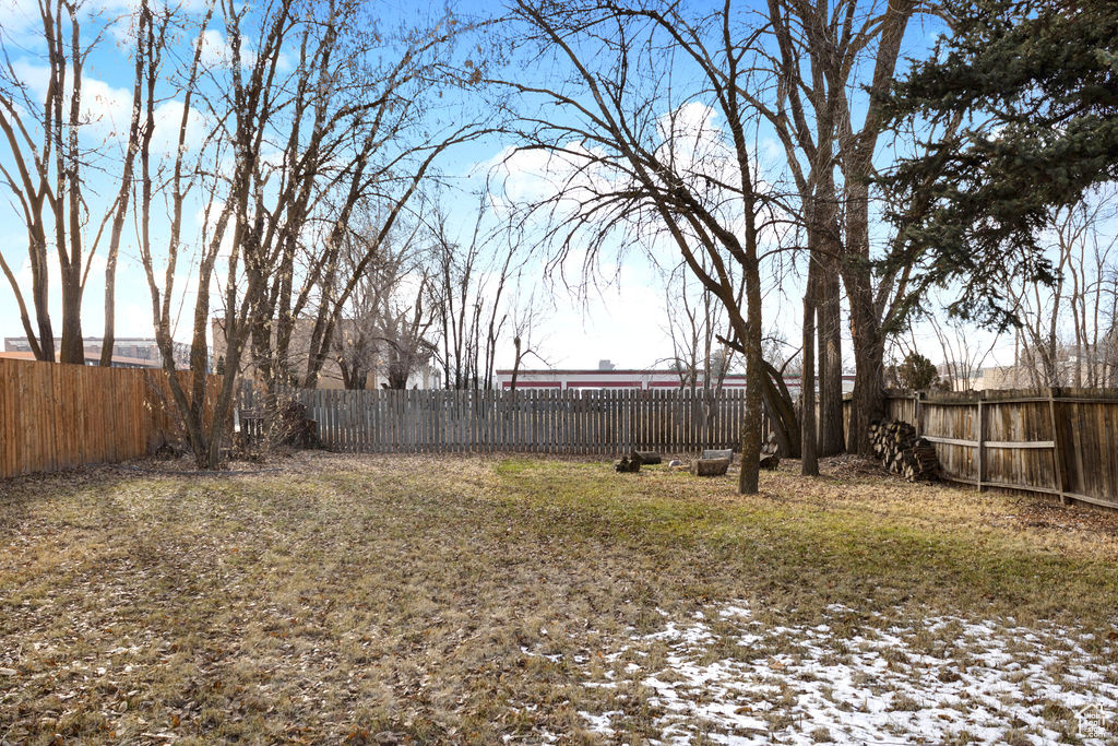 View of yard covered in snow