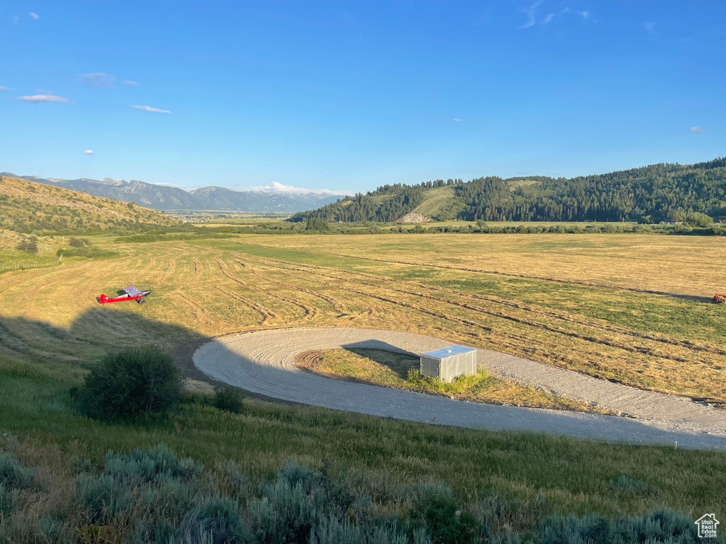 View of mountain feature with a rural view