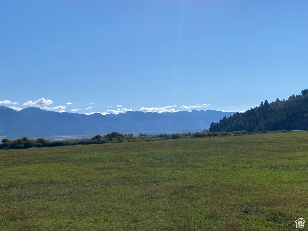 View of mountain feature with a rural view