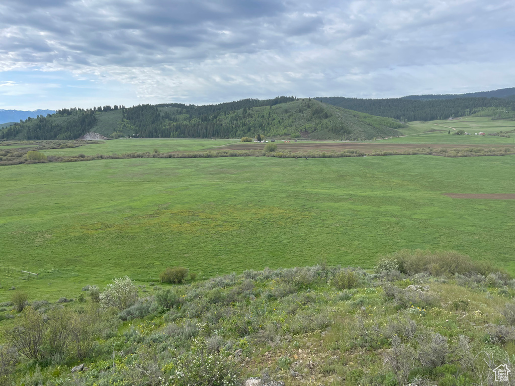 View of mountain feature with a rural view
