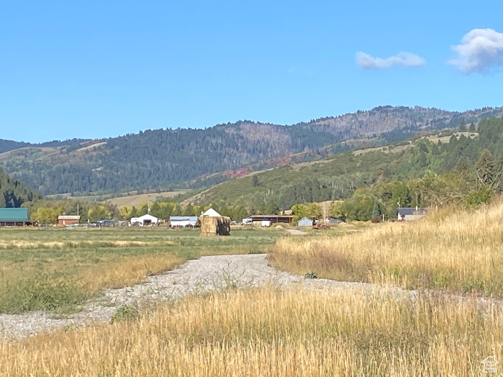 View of mountain feature with a rural view