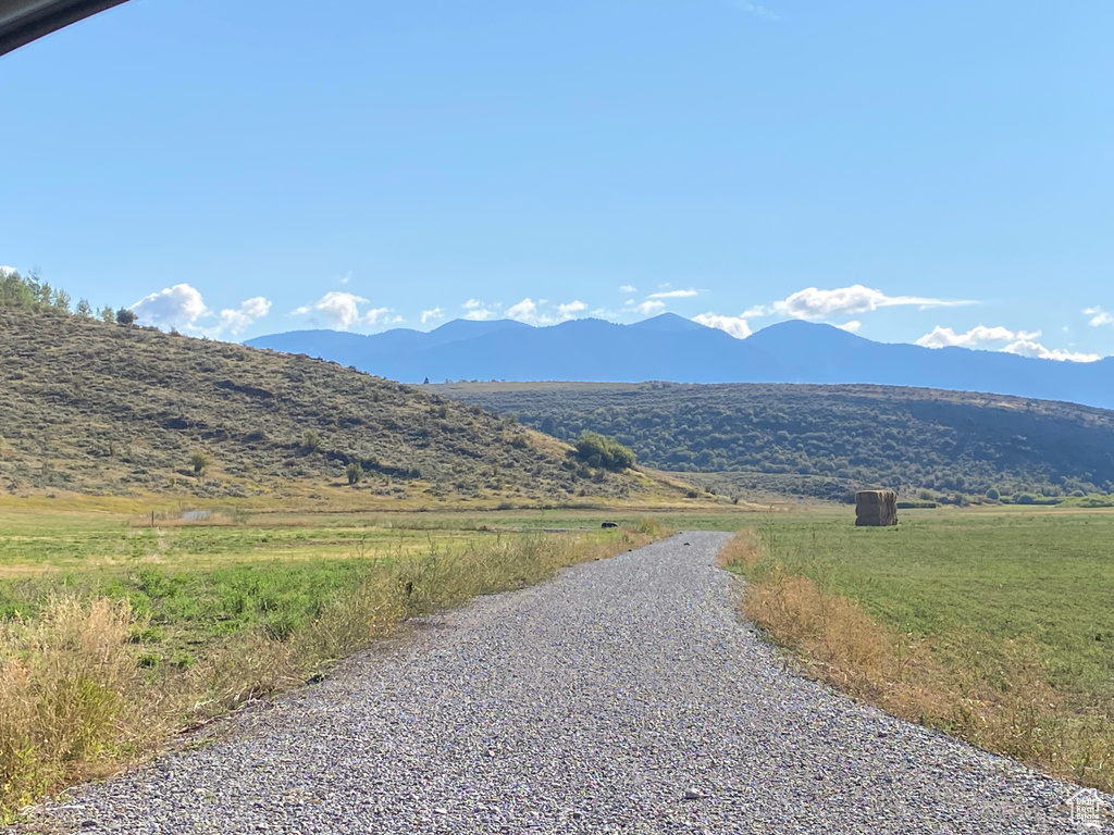 Property view of mountains featuring a rural view