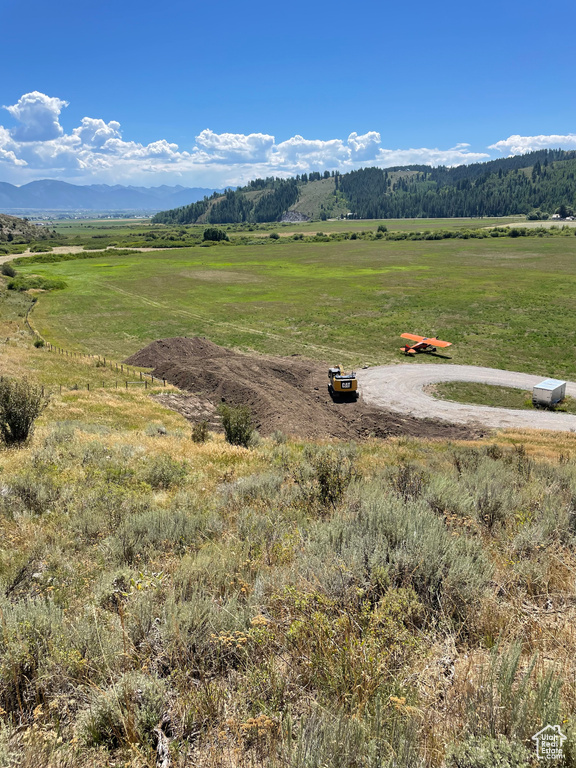 View of mountain feature with a rural view