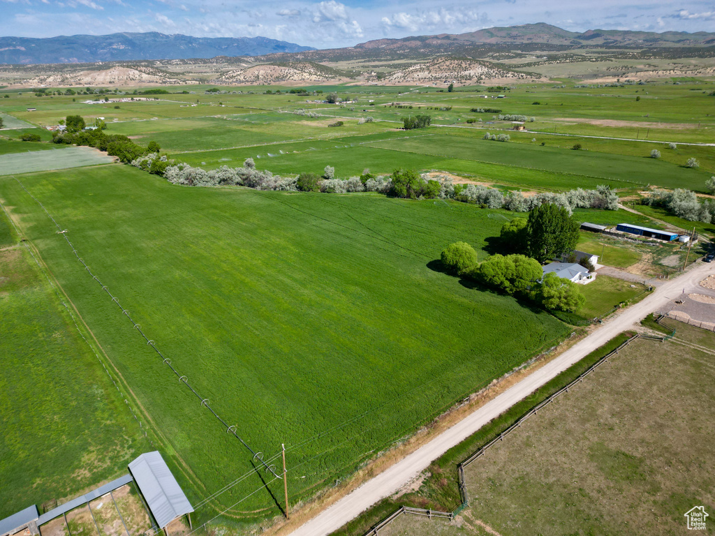 Aerial view of sparsely populated area featuring a mountain backdrop