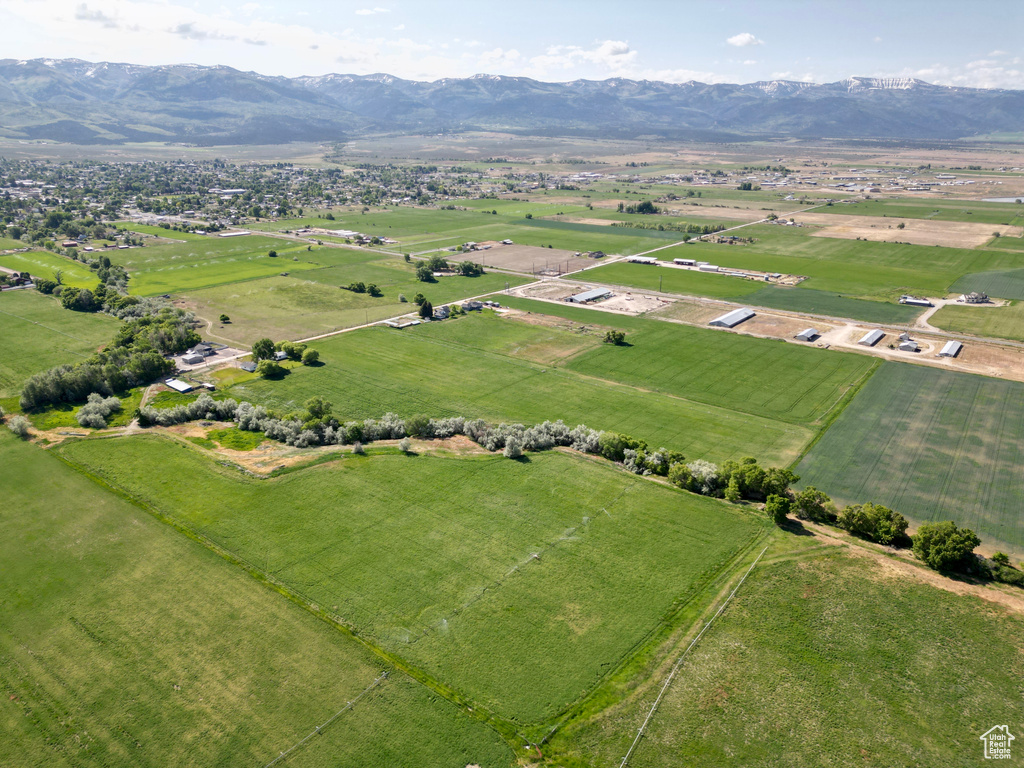 Aerial view of property's location featuring rural landscape and mountains