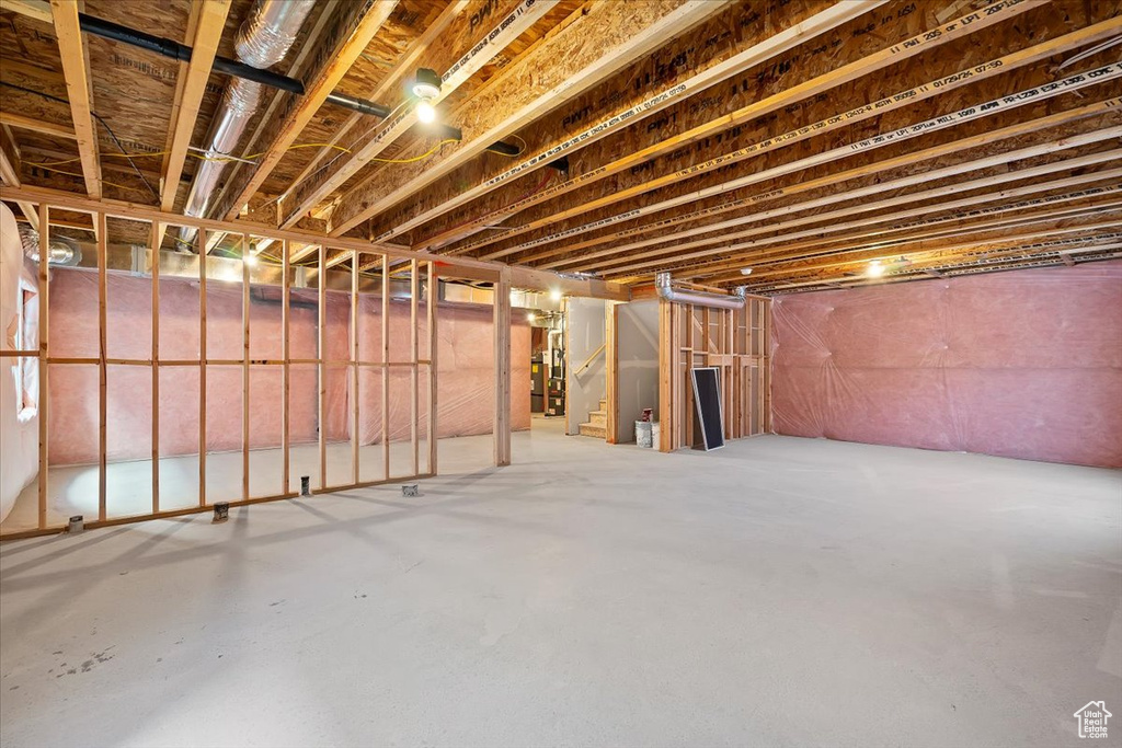 Basement featuring water heater