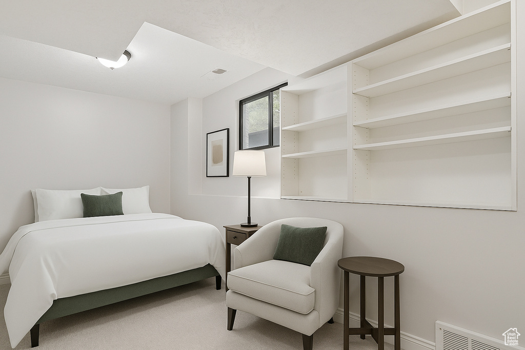 Bedroom with carpet flooring and baseboards